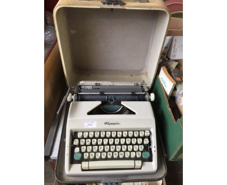 A CASED OLYMPIA TYPEWRITER   T4