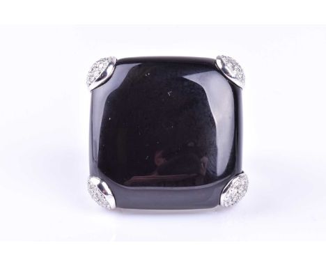 An onyx and diamond dress ring by Gavello, the cushion shaped onyx plaque secured with pear-shaped, pave set round brilliant 