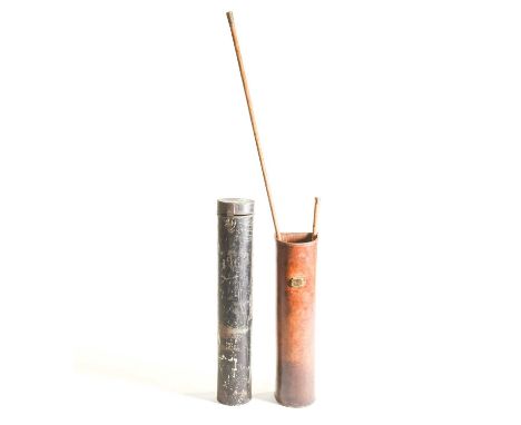 A 19th century leather demi lune gun holder with brass plaque initialled H.S., a gold mounted walking stick, a tall pokerwork