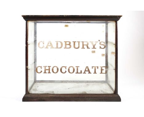 A Victorian Cadbury's Chocolate table top shop display cabinet, the interior to take two shelves and with white base, the ope