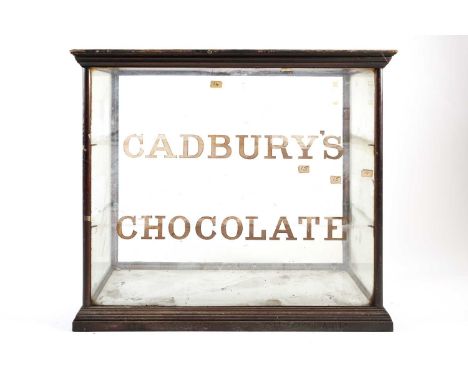 A Victorian Cadbury's Chocolate table top shop display cabinet, the interior to take two shelves and with white base, the ope