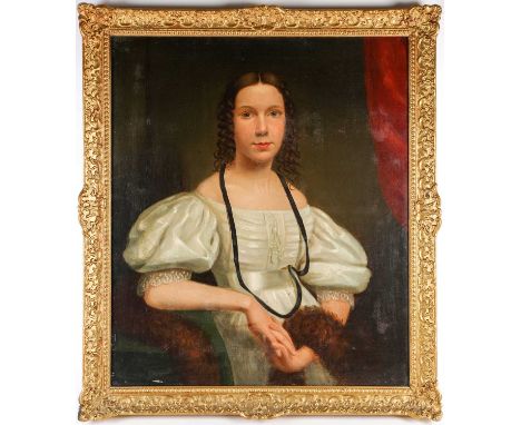 Late 19th century English school, a half-length portrait of a seated young woman, oil on canvas, unsigned, 71 cm x 60 cm in a