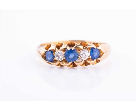 An 18ct yellow gold, diamond, and sapphire ringset with five alternating stones, size M 1/2, 3.5 grams.