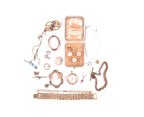 A group of costume jewellery and gilt metal items, to include a rose metal and mother-of-pearl dress stud set, a base metal m