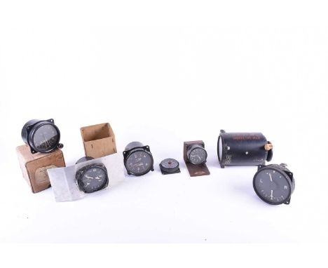 A collection of WWII era aircraft flight deck dials, comprising a British Mk 1A turning indicator (numbered 7630/A5, with bro