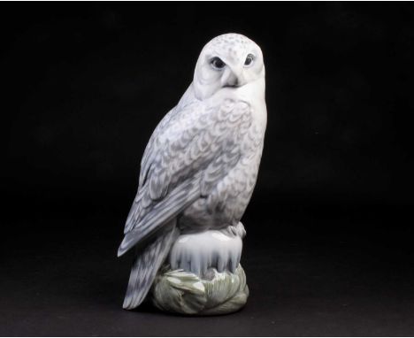 A large Royal Copenhagen model of a snowy owl, with printed and painted mark to base no 1829, 39.5cm tall.Condition report: N