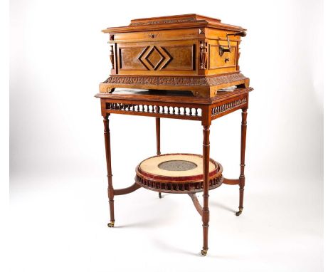 A Victorian carved walnut and inlaid tabletop Polyphon, late 19th century, playing 39.5cm diameter discs on two combs, the li