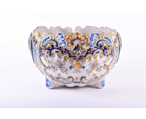 A French faience ware planter, 20th century, decorated in polychrome enamels on three feet, 17.5 cm high x 27 cm diameter.Con
