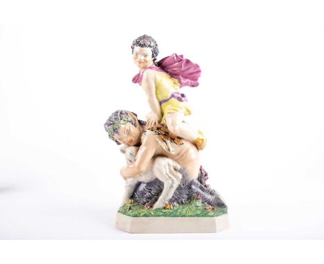 A Charles Vyse ceramic figure group, 'La Folie Bergere' circa 1927, a child in a purple cape leapfrogging Pan, decorated in p