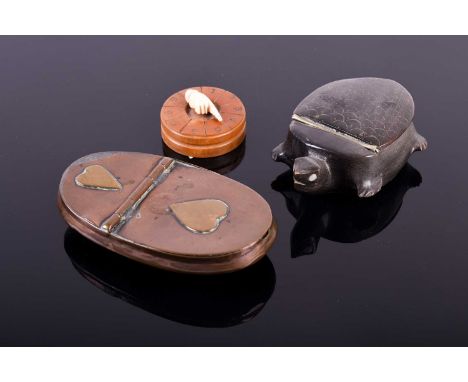 A 19th century carved horn snuff box in the form of a tortoise, a Geo III copper snuff box, of oval form with slightly bowed 