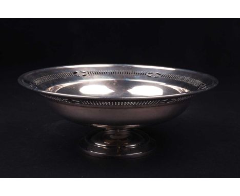 A George V silver fruit bowl, Chester 1924 by Barker Brothers, with pierced rim on a stepped circular foot, 9 cm high x 25 cm