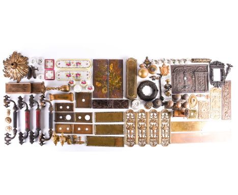 A large quantity of door furniture, the majority early 19th - early 20th century, to include cast door knockers, cast and pre