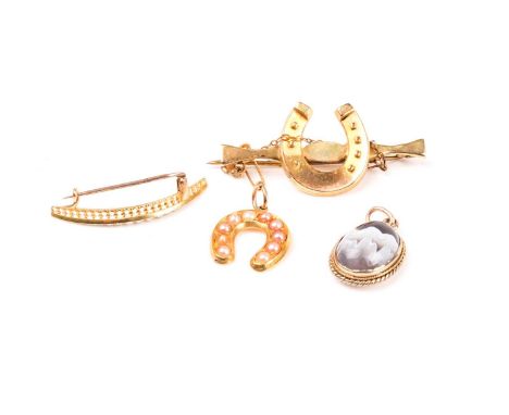 A yellow metal and pearl horseshoe pendant, unmarked, together with a yellow metal and seed pearl cresent brooch, a gilt meta