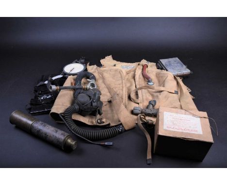 A German Luftwaffe pilots/aircrew life jacket, type SWp 734, with original gas cannister, valve and mouthpiece inflater, the 