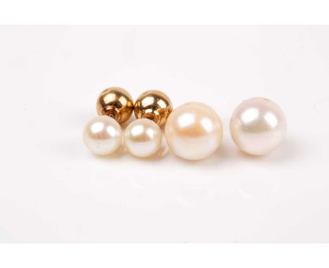A pair of reversable pearl and gold stud earrings (to wear either way), together with a pair of pearl stud earrings with yell