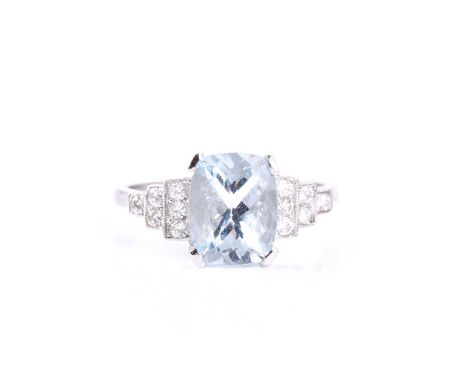 A platinum, diamond, and aquamarine ring, set with a mixed cushion-cut aquamarine of approximately 2.50 carats, with stepped 