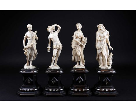 A group of four 19th century European ivory figures, comprising representations of 'The Four Seasons', each finely modelled a