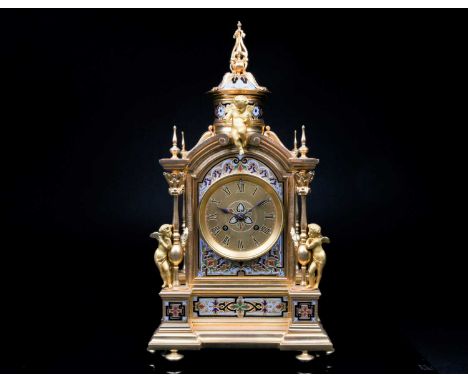 A French gilt metal and champleve enamel mantel clock, with eight day movement chiming on a bell, the movement struck LeRoy&a