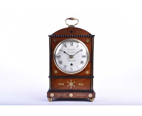 A Regency mahogany bracket clock with inlaid brass and ebonised detail, 'Grant, Fleet Street, London', the enamel dial bearin
