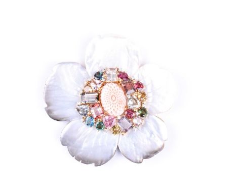 A carved mother of pearl, coral and multi-gem set tutti-frutti flower brooch, the carved pink coral centre with a surround of
