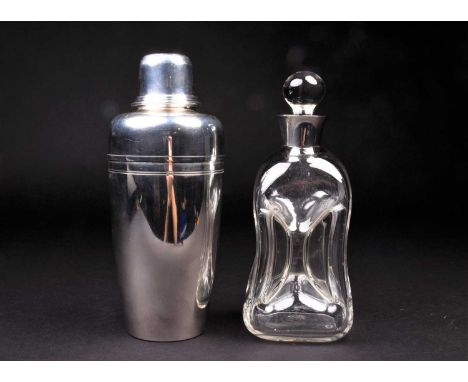 A sterling silver Tiffany &amp; Co cocktail shaker, of plain form, 23.5 cm high (730g), together with a silver mounted 'Glug 