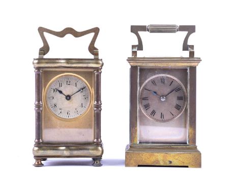 Two late 19th century gilt brass four-glass carriage clocks, each with circular dial, one with Arabic and one with Roman nume
