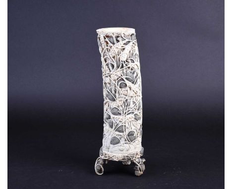 A Japanese carved ivory tusk, Meiji period, circa 1890/1900, imaginatively carved as a flock of quail feasting upon millet an