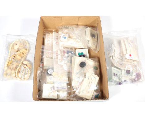A quantity of loose stones, including a black opal, black opal beads, other white opals, lapis lazuli, coral beads and carvin