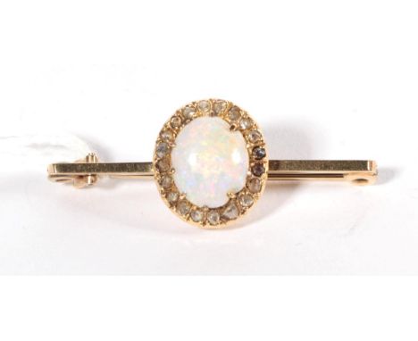 An opal and diamond cluster bar brooch, to a 9 carat gold bar, measures 4cm long (opal chipped), 3.5g