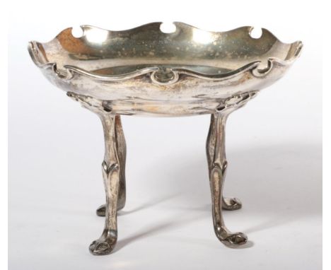 ~ An Edwardian Art Nouveau silver dish, by William Hutton &amp; Sons, London, 1906, raised on four tall supports, 9.8ozt