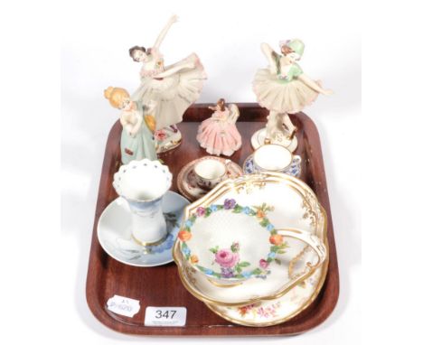 A tray including three German china figurines; a Coalport miniature trio; Spode miniature; blue and white cup and saucer; Cop