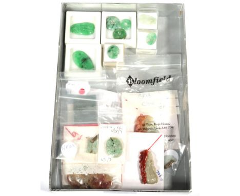 Twelve various carved jade plaques, a jade oblong plaque and three jade bi