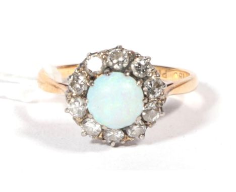 An opal and diamond cluster ring, total estimated diamond weight 0.50 carat approximately, finger size N, stamped '18CT PLAT'