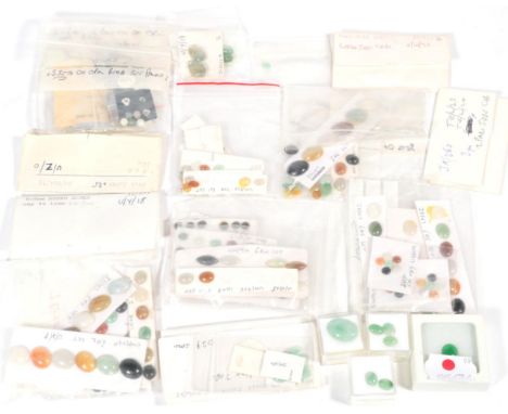 A quantity of loose stones Jade Cabochons, including green, brown and other colours 