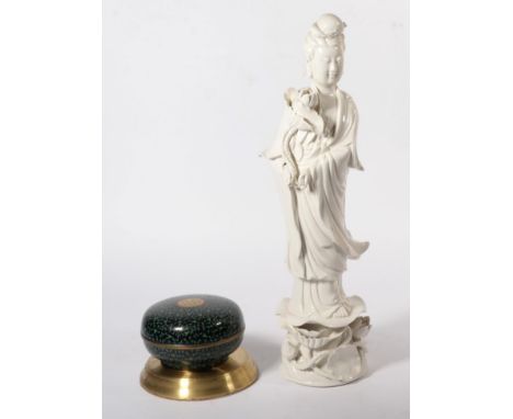 A Chinese Blanc de Chine model of Guanyin; and a Cloisonne enamel box and cover (2) 