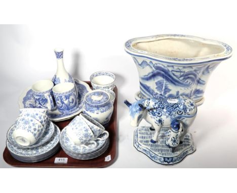 Minton 'Shalimar' pattern blue and white teaset; Spode Italian bottle shaped vase; 20th century Delft figure of a cow; and a 