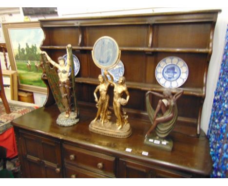 Three Art Nouveau style figures