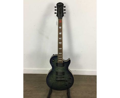 GIBSON EPIPHONE LES PAUL ELECTRIC GUITAR, no I02091326, marbled sunburst body, along with a line 6 Spider IV 15 amplifierguit