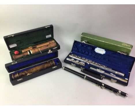 GROUP OF FOUR WIND INSTRUMENTS, comprisng a Adler tenor recorder, tenor sordune, Elkhart flute, and a Miller Brown flute
