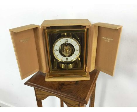 JAEGER LeCOULTRE, ATMOS CLOCK, serial number 100009, the white enamel dial with Arabic numerals at 3, 6, 9 and 12, and gilt h