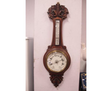 Early XX Century Oak Banjo Barometer, with poker work carving and thermometer to neck, 88cm high.