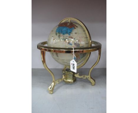 Mineral Terrestrial Globe, in brass stand, having three legs, united by compass, approximately 34cm high.