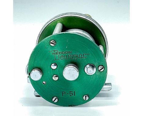 Pretty casting reel with newer technology of using aluminum and anodization. Green colored end plates with coin edged and knu