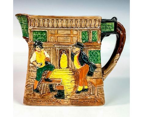 Glazed porcelain pitcher embossed with various characters from the novel The Pickwick Papers. Royal Doulton backstamp. Issued