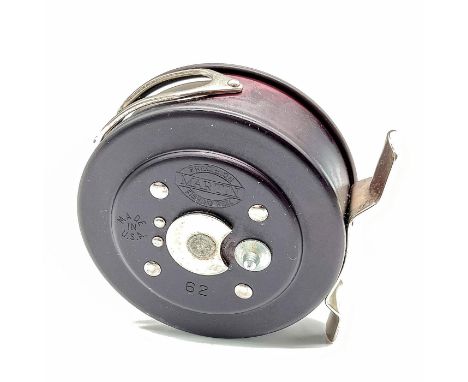 Vintage fly reel in an attractive plum colored aluminum. Issued: c. 1960'sDimensions: 3"L x 2.25"W x 3"HManufacturer: MartinC