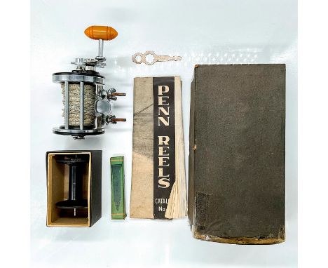 Fantastic grouping of reel, original box with graphic label, catalog No 13, bag, wrench, lube, and spare spool. The perfect s