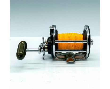 Nice versatile light tackle casting reel. Beautiful body with etched burgundy side plates, green swirled composite handle. an