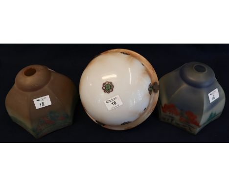 A group of 1920s style glass light fittings to include; two shades decorated with cottages and a printed ceiling light bowl. 