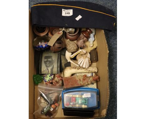 Box of oddments to include: ceramic figures, Chinese soapstone figure, horn walking stick handle, glass paperweight, diecast 