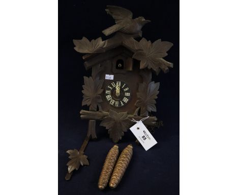 Black forest two train stained wooden cuckoo clock.(B.P. 24% incl. VAT)